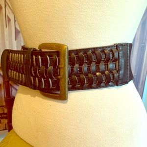 Black, wide stretch belt with brass metal buckle